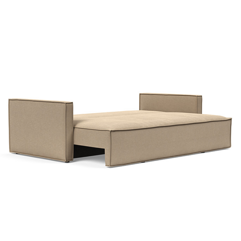 The Newilla Sleeper Sofa from Innovation Living with slim arms and phobos mocha 587 upholstery setup as a bed.