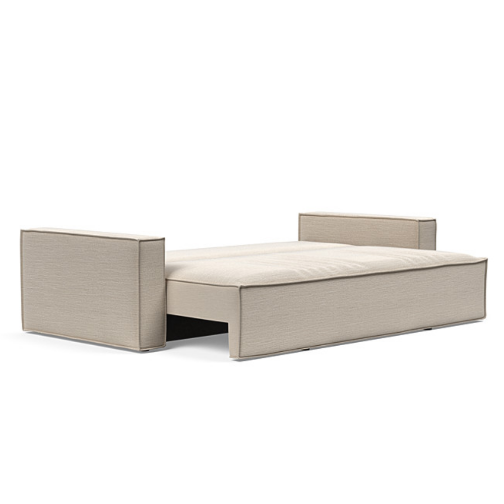 The Newilla Sleeper Sofa from Innovation Living with standard arms and blida sand grey 612 upholstery setup as a bed.
