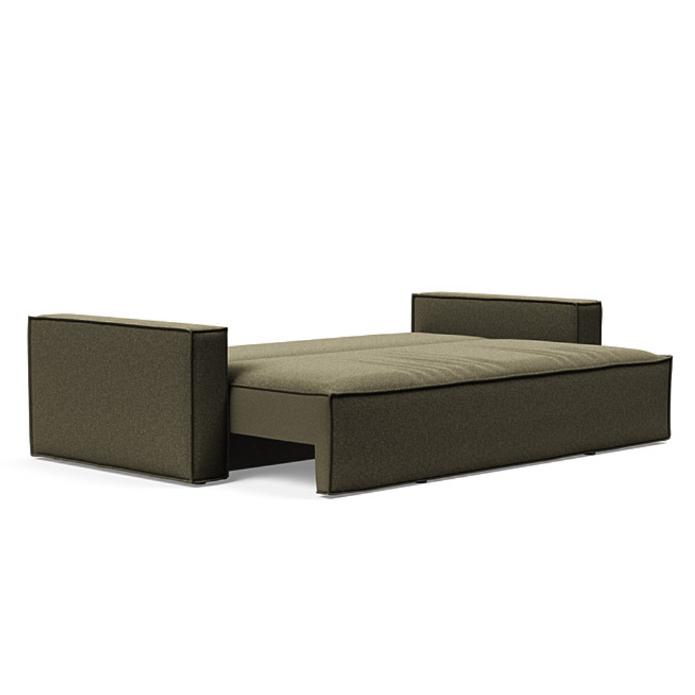 The Newilla Sleeper Sofa from Innovation Living with standard arms and boucle forest green 535 upholstery setup as a bed.