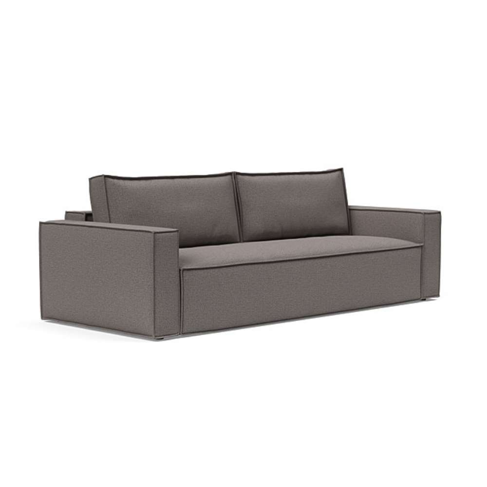 The Newilla Sleeper Sofa from Innovation Living with standard arms and mixed dance grey 521 upholstery setup as a sofa.