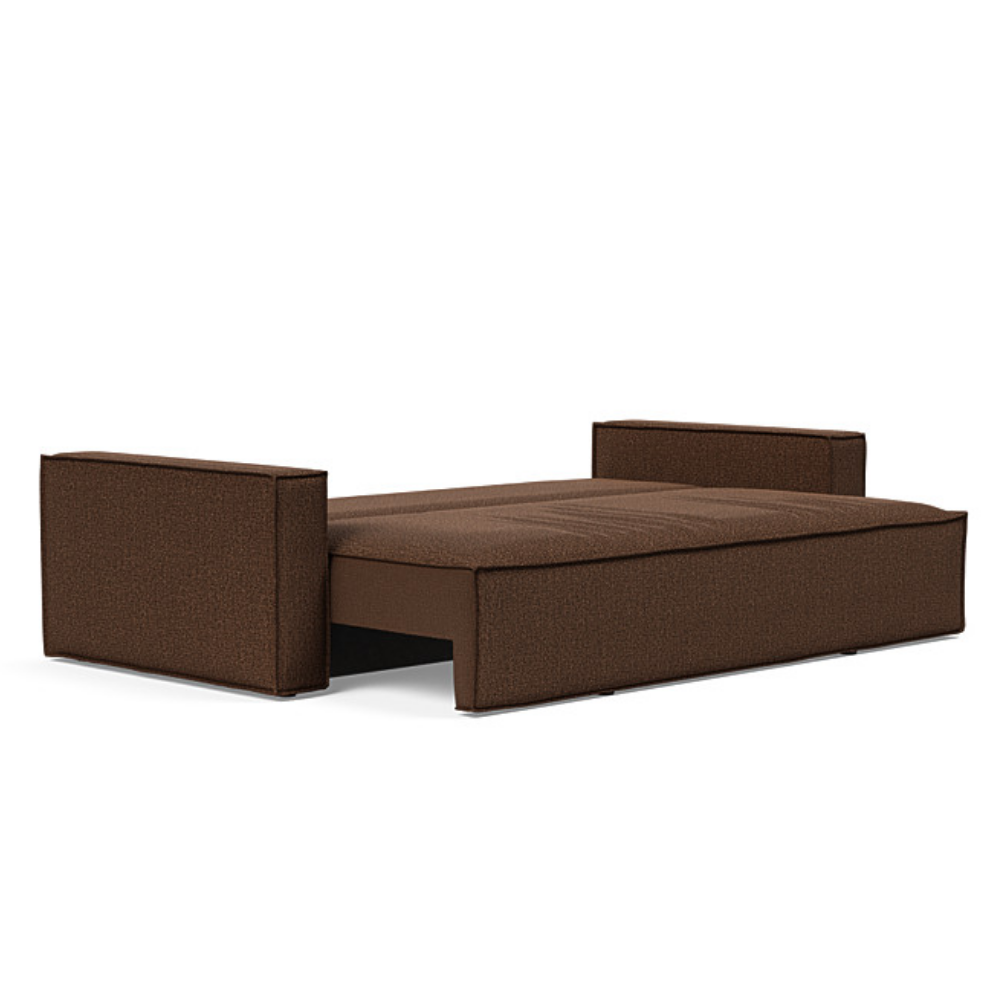 The Newilla Sleeper Sofa from Innovation Living with standard arms and taura cappuccino 359 upholstery setup as a bed.
