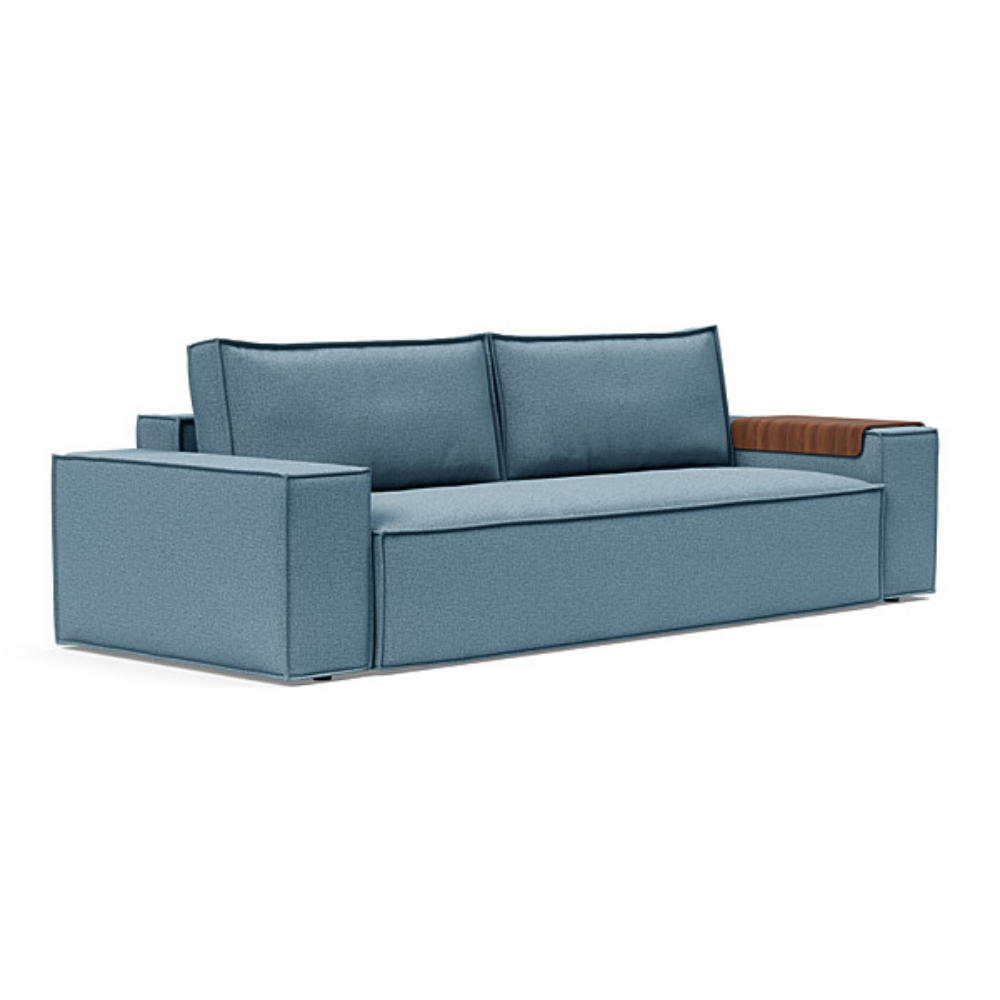 The Newilla Sleeper Sofa from Innovation Living with wide arms and mixed dance light blue 525 upholstery setup as a sofa.
