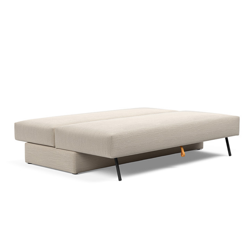 The Osvald Sofa Bed from Innovation Living with blida sand grey 612 upholstery setup as a bed.
