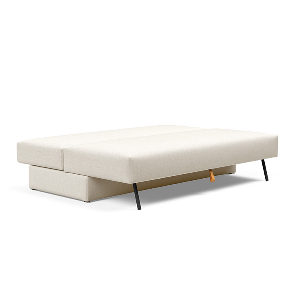 The Osvald Sofa Bed from Innovation Living with boucle off white 531 upholstery setup as a bed.