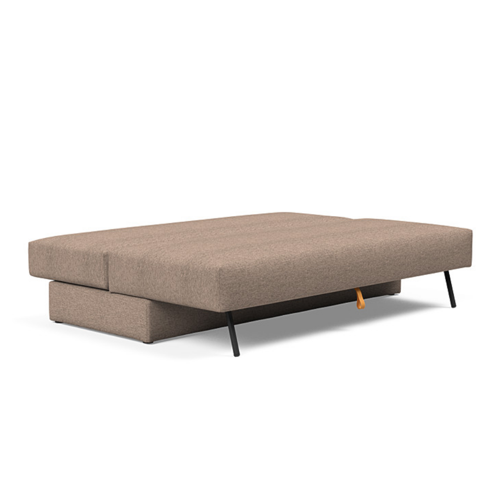 The Osvald Sofa Bed from Innovation Living with halifax wicker 367 upholstery setup as a bed.