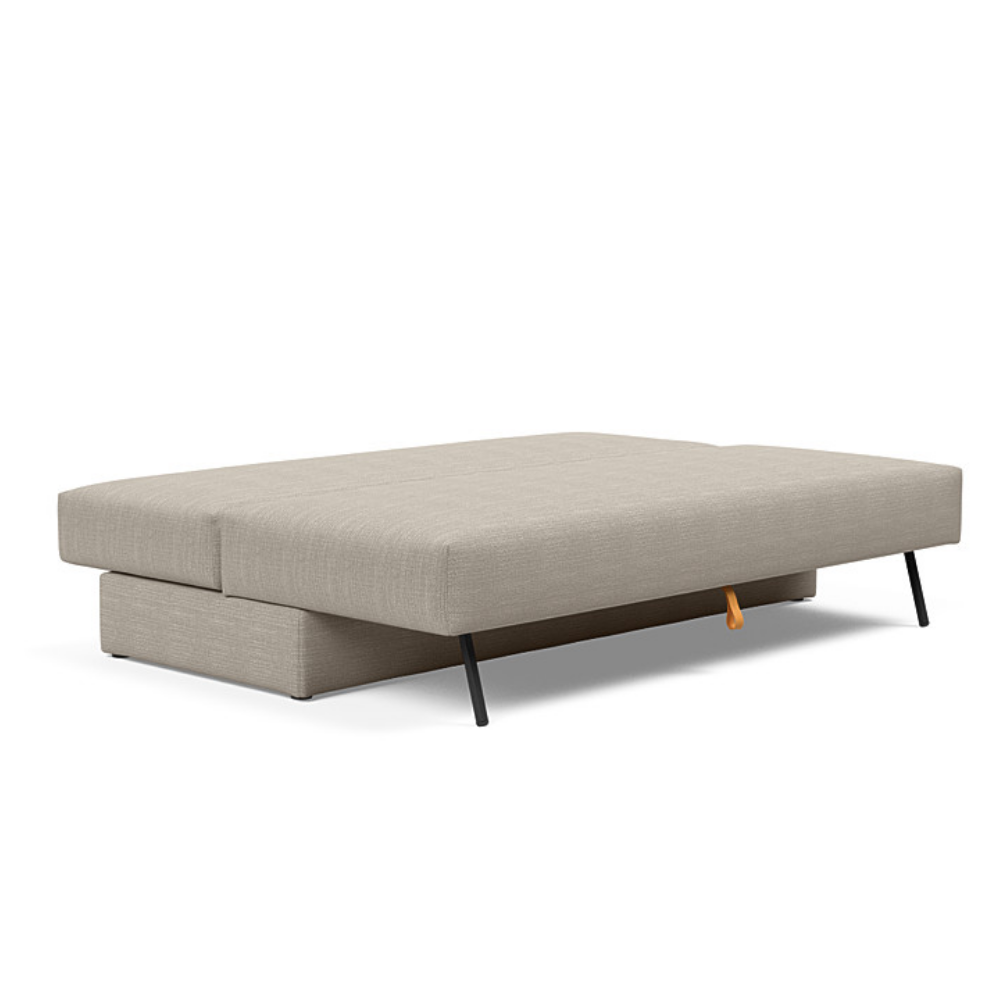 The Osvald Sofa Bed from Innovation Living with kenya gravel 579 upholstery setup as a bed.