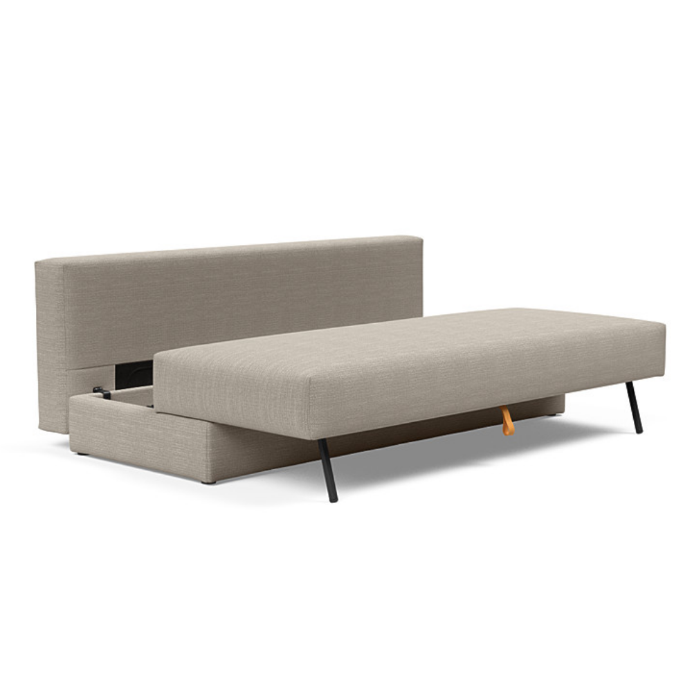The Osvald Sofa Bed from Innovation Living with kenya gravel 579 upholstery showing the internal storage unit.