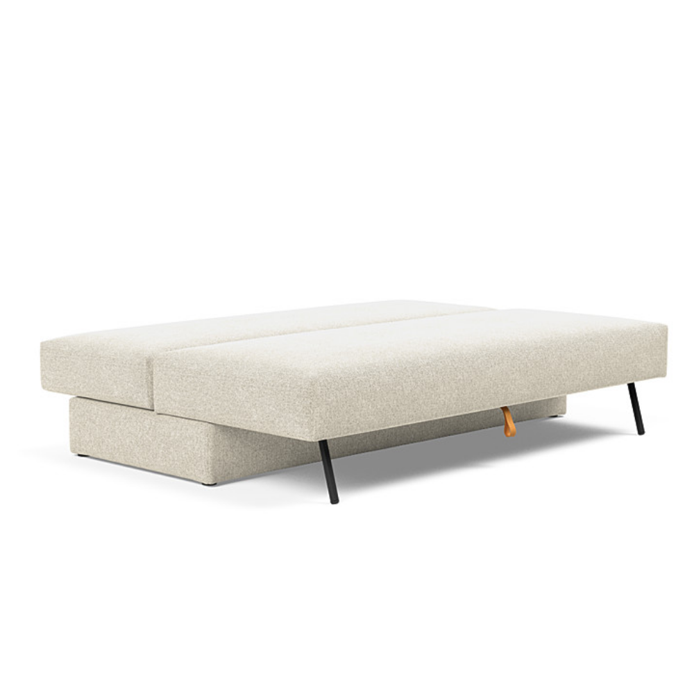 The Osvald Sofa Bed from Innovation Living with taura off white 357 upholstery setup as a bed.