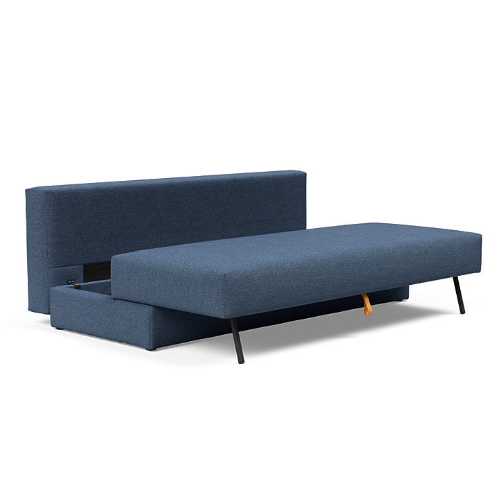 The Osvald Sofa Bed from Innovation Living with weda blue 302 upholstery showing the internal storage space.