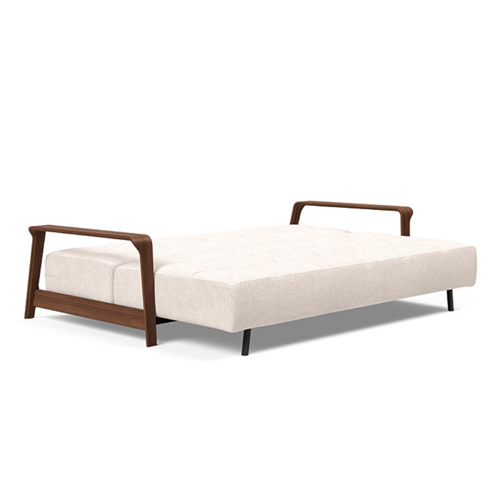 The Ran D.E.L Sofa Bed from Innovation Living with adario basmati 255 upholstery setup as a bed.