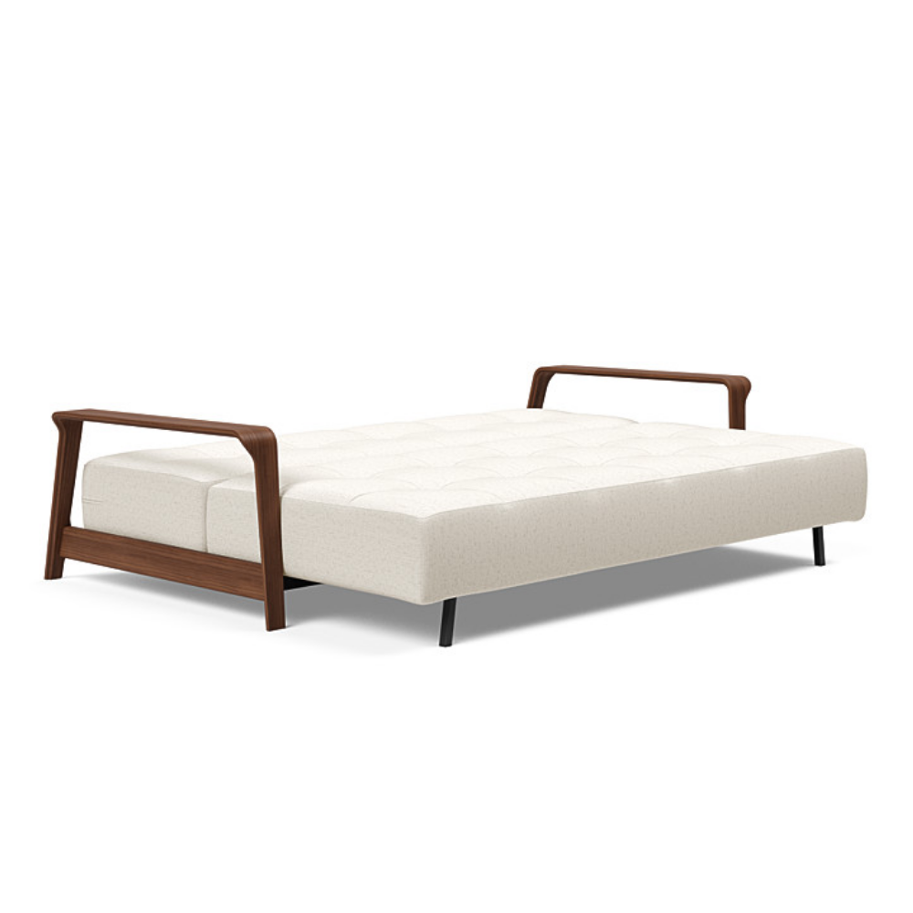 The Ran D.E.L Sofa Bed from Innovation Living with boucle off white 531 upholstery setup as a bed.