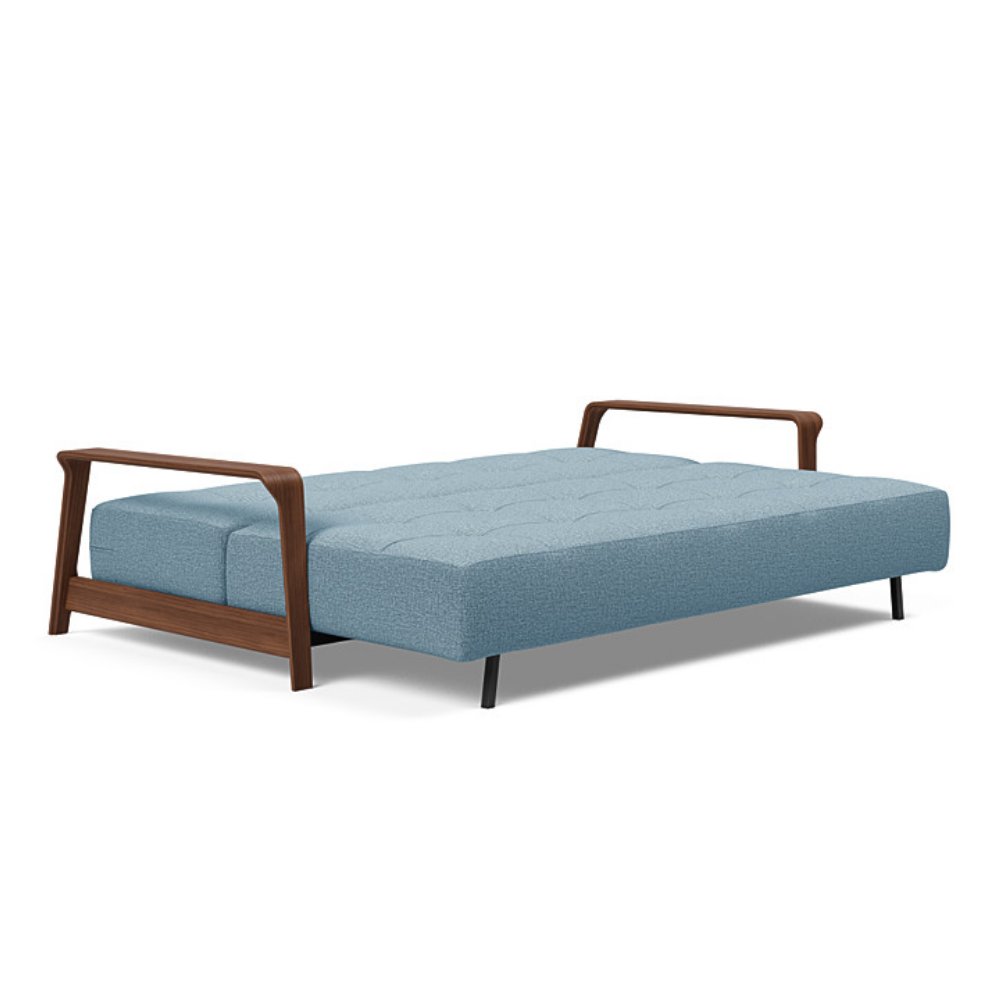 The Ran D.E.L Sofa Bed from Innovation Living with mixed dance light blue 525 upholstery setup as a bed.