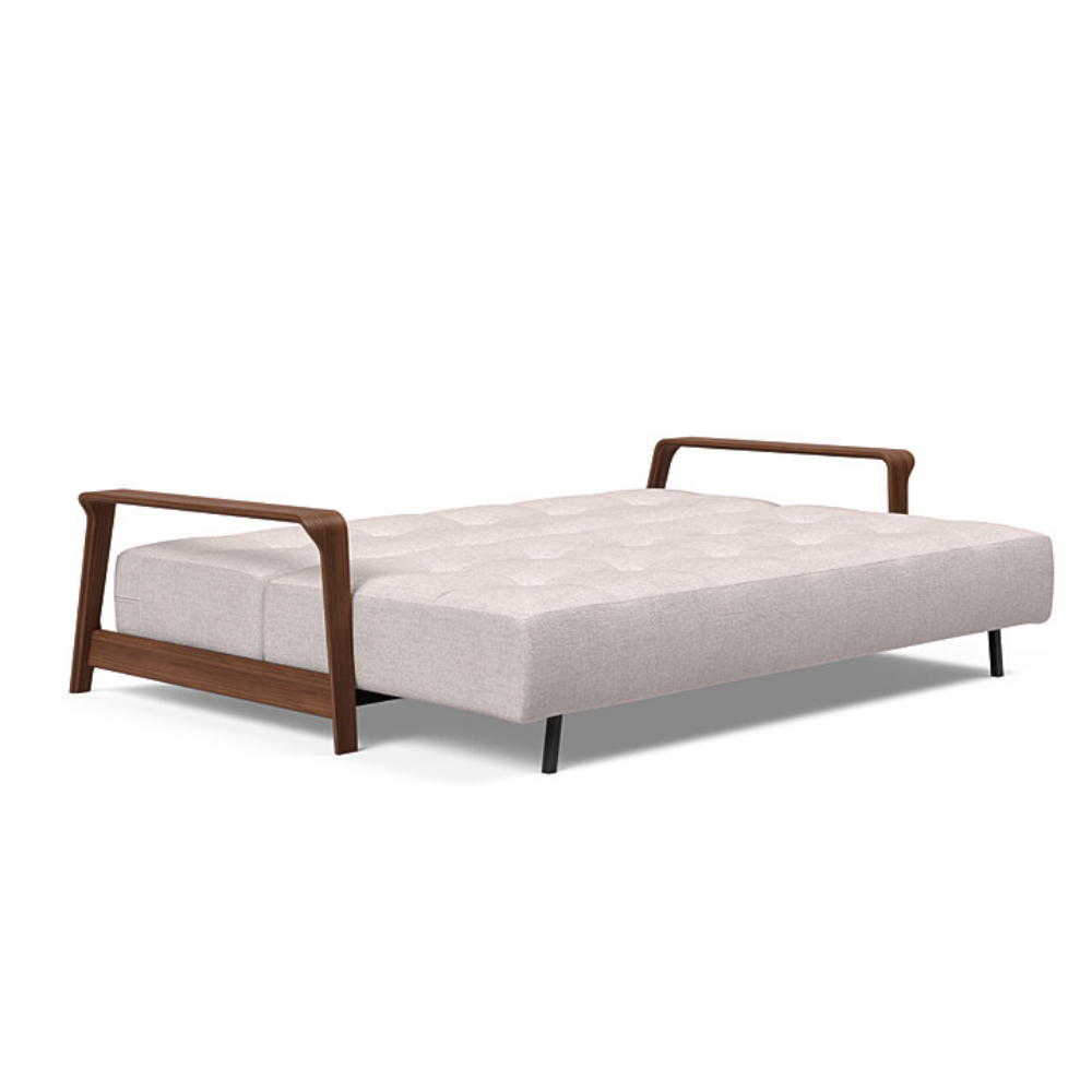 The Ran D.E.L Sofa Bed from Innovation Living with weda sand 300 upholstery setup as a bed.