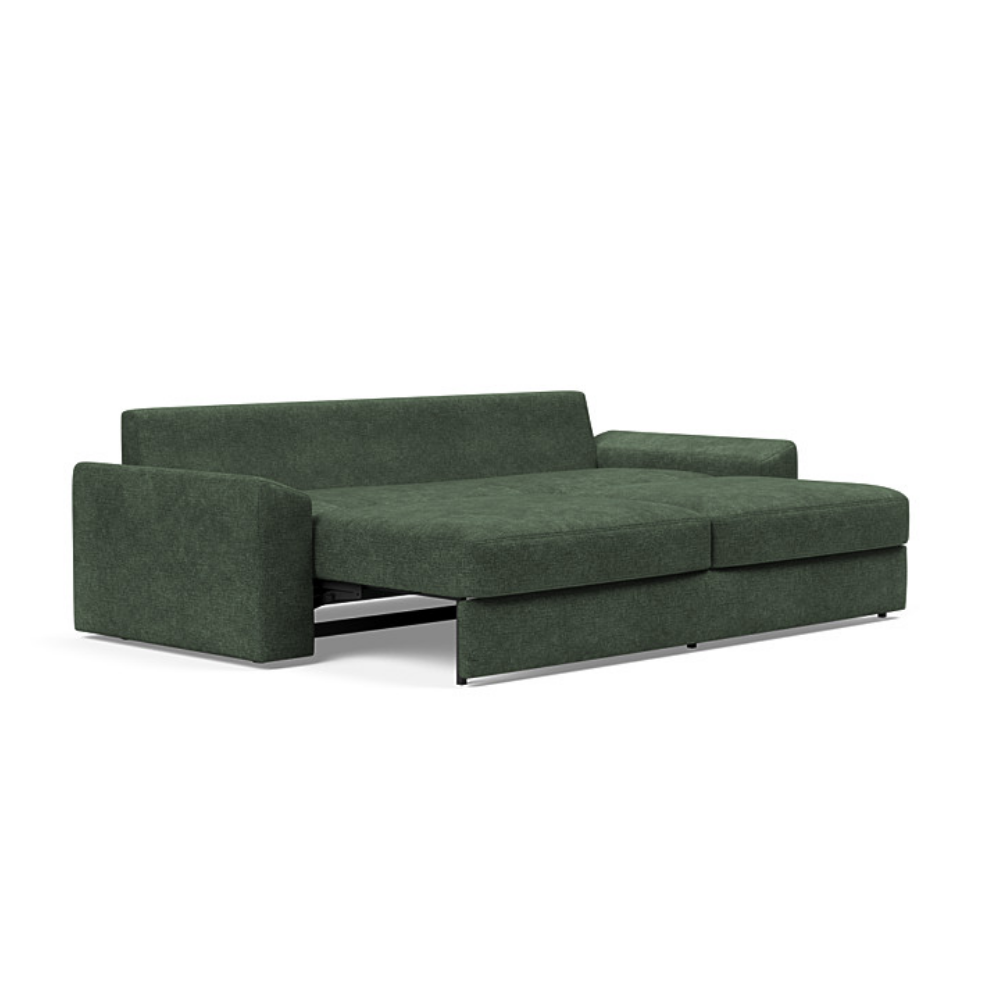 The Vilander Sleeper Sofa With Cushion Arms from Innovation Living with avella pine green 281 upholstery setup as a bed.