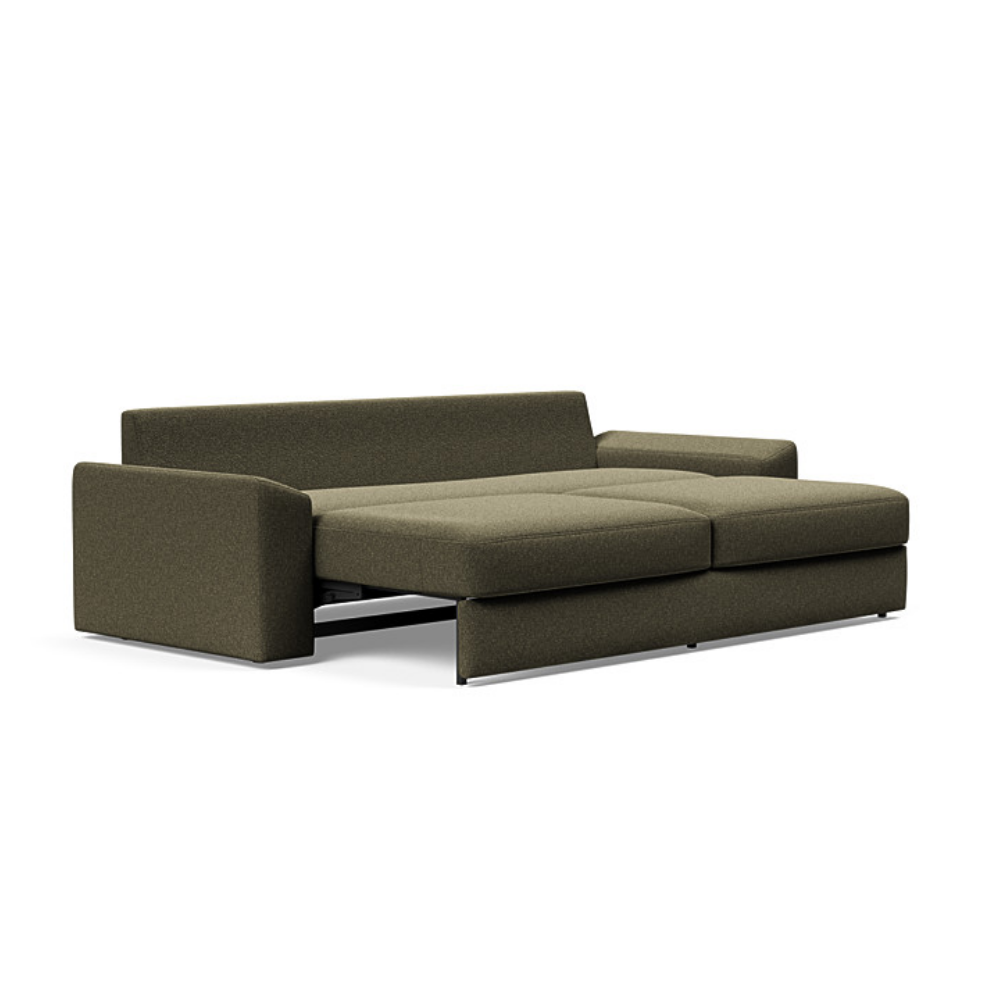 The Vilander Sleeper Sofa With Cushion Arms from Innovation Living with boucle forest green 535 upholstery setup as a bed.