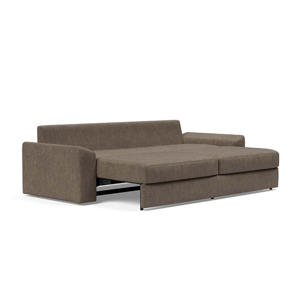 The Vilander Sleeper Sofa With Cushion Arms from Innovation Living with esina cedar brown 411 upholstery setup as a bed.