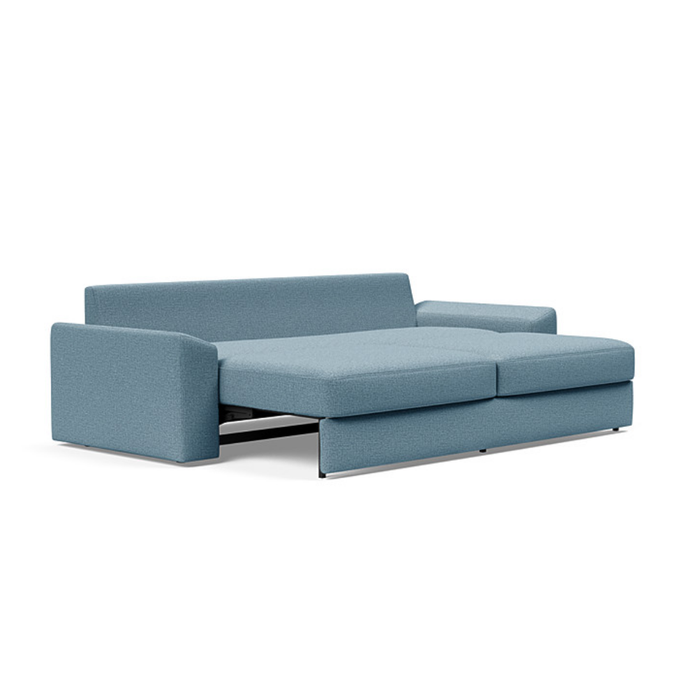 The Vilander Sleeper Sofa With Cushion Arms from Innovation Living with mixed dance light blue 525 upholstery setup as a bed.