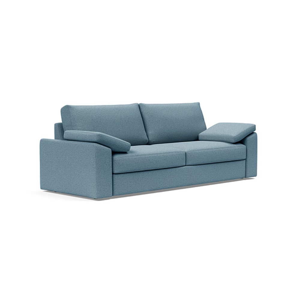 The Vilander Sleeper Sofa With Cushion Arms from Innovation Living with mixed dance light blue 525 upholstery setup as a couch.