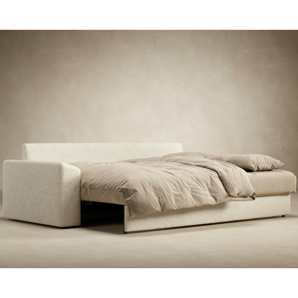 The Vilander Sleeper Sofa With Cushion Arms from Innovation Living in a studio setup as a bed. all-groups