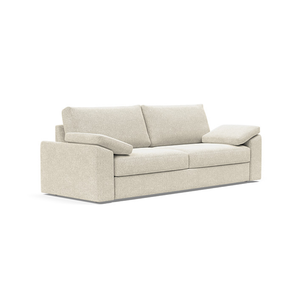 The Vilander Sleeper Sofa With Cushion Arms from Innovation Living with taura off white 357 upholstery setup as a couch.