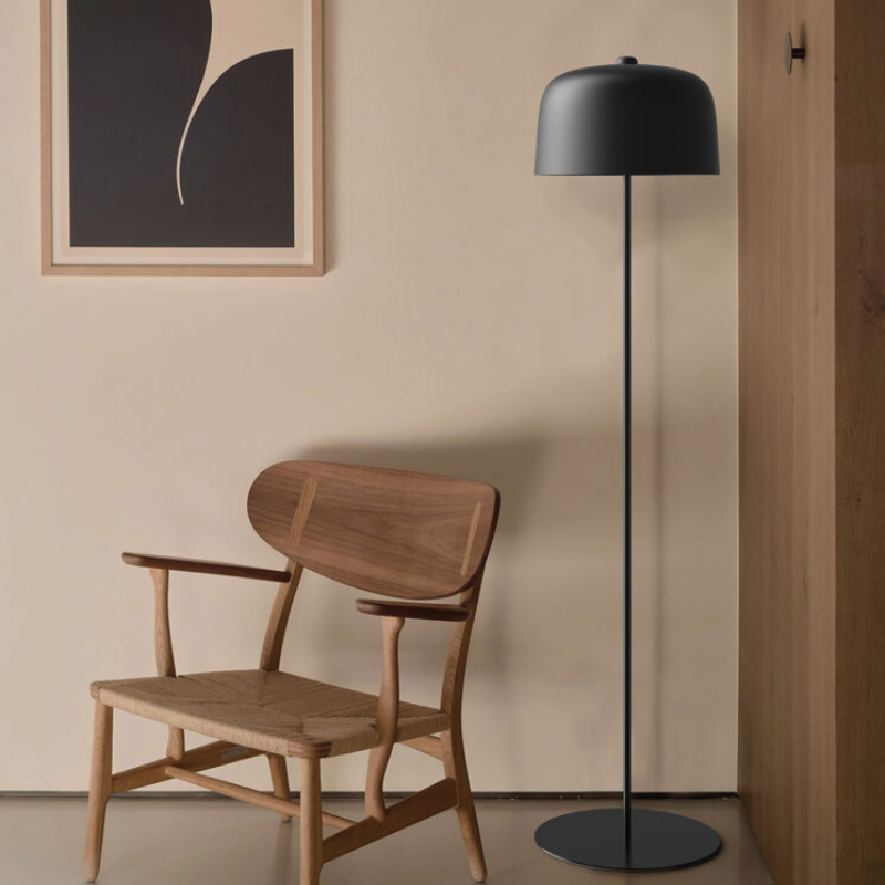 The Zile Floor Lamp from Luceplan in a living room.