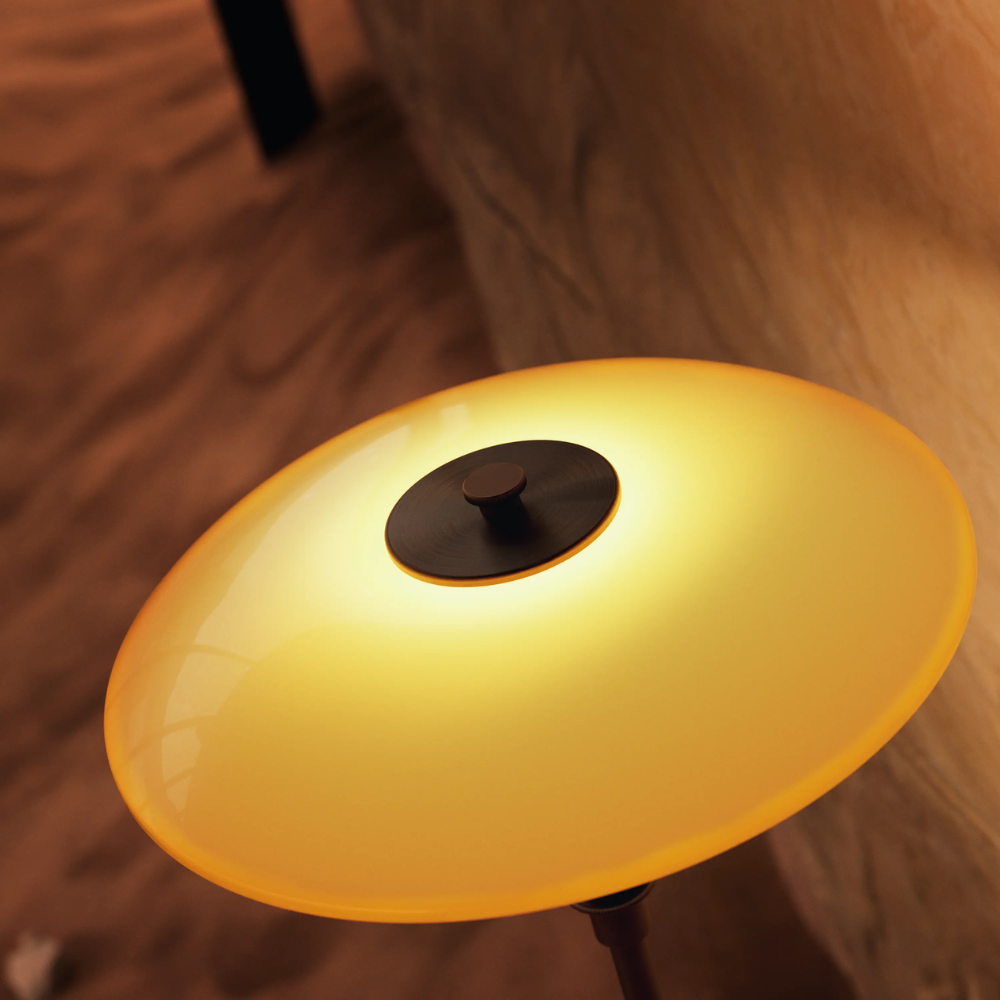 Hand-blown four-layered amber-colored glass Shade of the PH 3/2 Table Lamp Centenary Edition by Louis Poulsen.