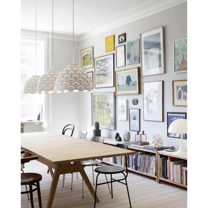 The LC Shutters Pendant from Louis Poulsen in a living room.