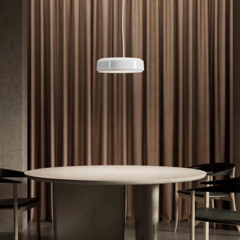 The LP Grand Suspended from Louis Poulsen in a dining room.