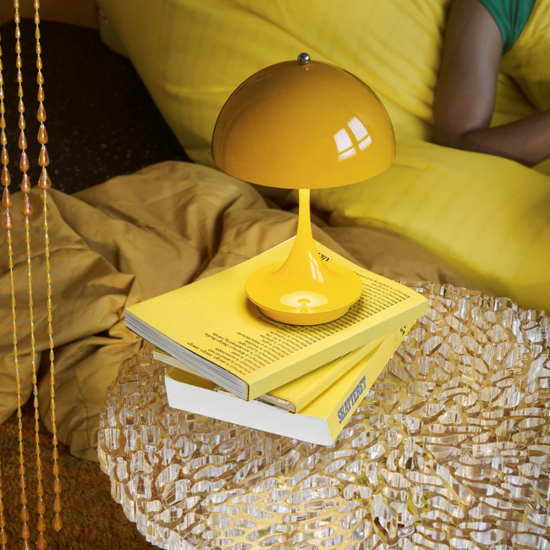 The Panthella 160 Portable Lamp from Louis Poulsen in yellow.