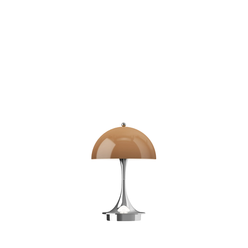 The Panthella 160 Portable Lamp from Louis Poulsen in Original Opal Brown turned on.