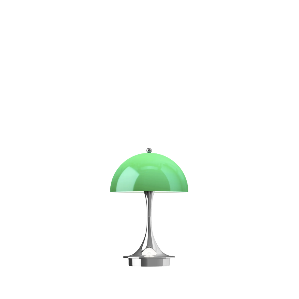 The Panthella 160 Portable Lamp from Louis Poulsen in Original Opal Green turned on.