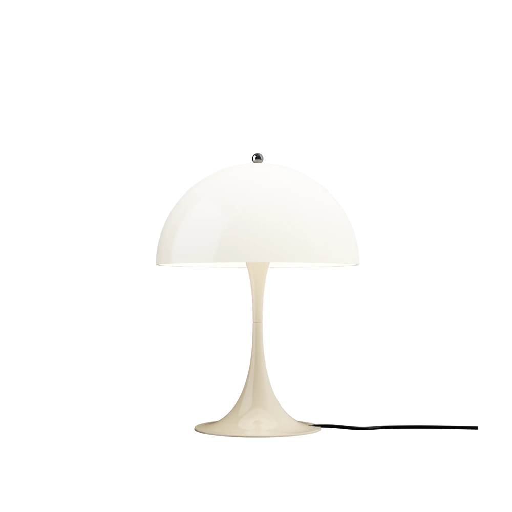 The Panthella 320 Table Lamp from Louis Poulsen in Opal Beige turned on.