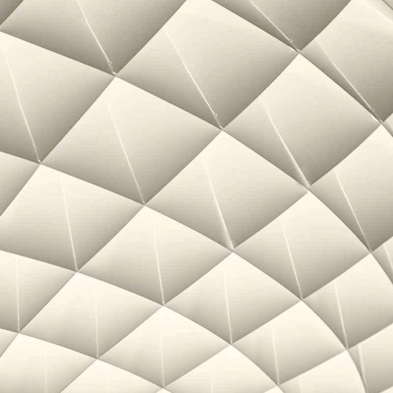 The Patera Pendant from Louis Poulsen in a close up shot of the light. all-groups