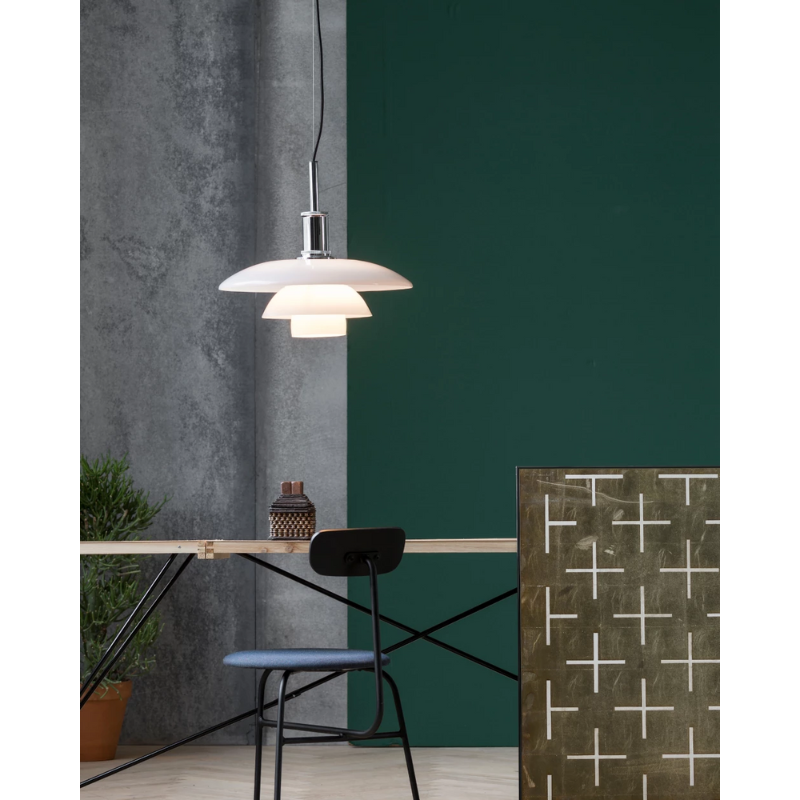 The PH 4½-4 Pendant from Louis Poulsen in a home office.