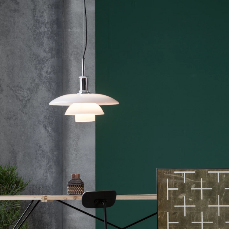 The PH 4½-4 Pendant from Louis Poulsen in a home office.