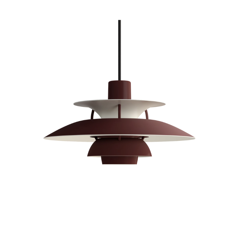 The PH 5 Mini Pendant from Louis Poulsen in monochrome burgundy turned off.