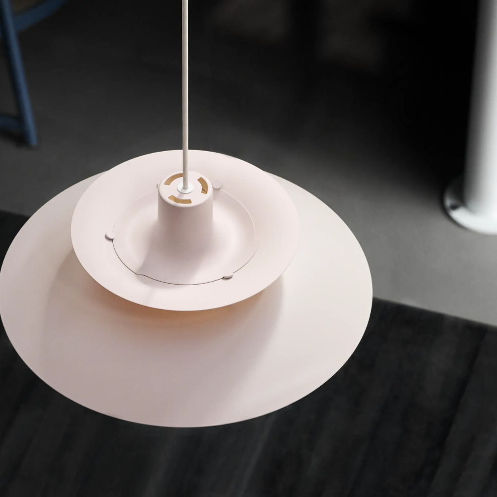 The PH 5 from Louis Poulsen in monochrome pale rose from above.