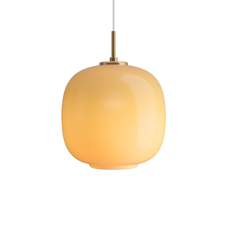 The 9.8 inch VL 45 Radiohus Pendant from Louis Poulsen with amber glass turned on.