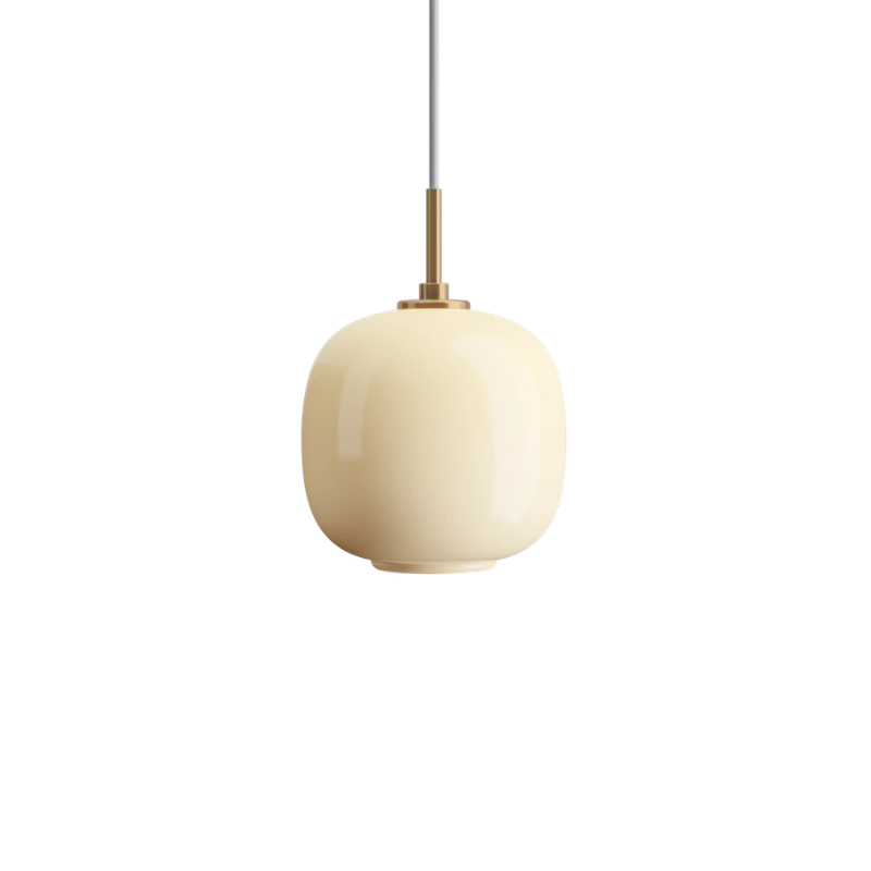 The 6.9 inch VL 45 Radiohus Pendant from Louis Poulsen in pale yellow glass turned off.