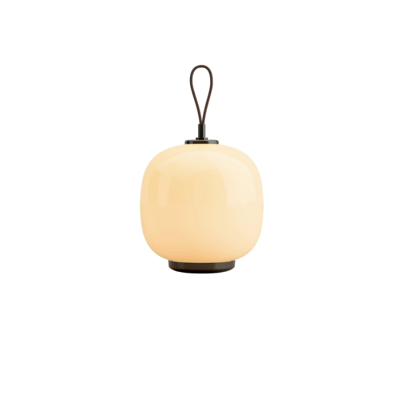 The VL 45 Radiohus Portable Lamp from Louis Poulsen in pale yellow glass turned off.