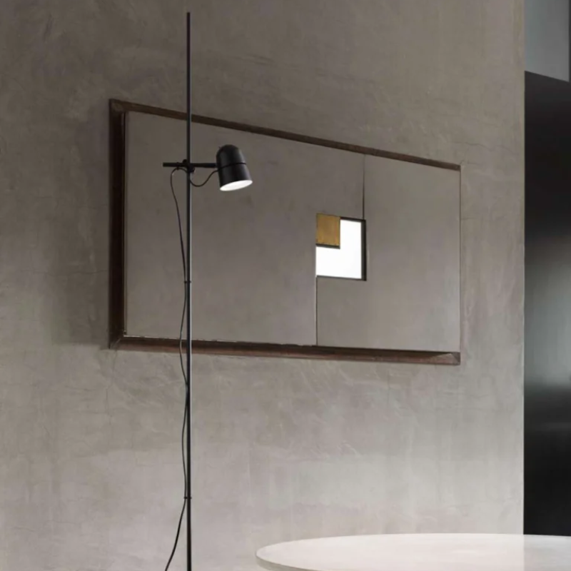 The Counterbalance Floor Lamp from Luceplan in a dining room.