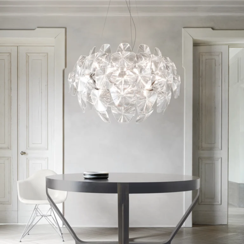 The Hope Chandelier from Luceplan in a dining room. all-groups