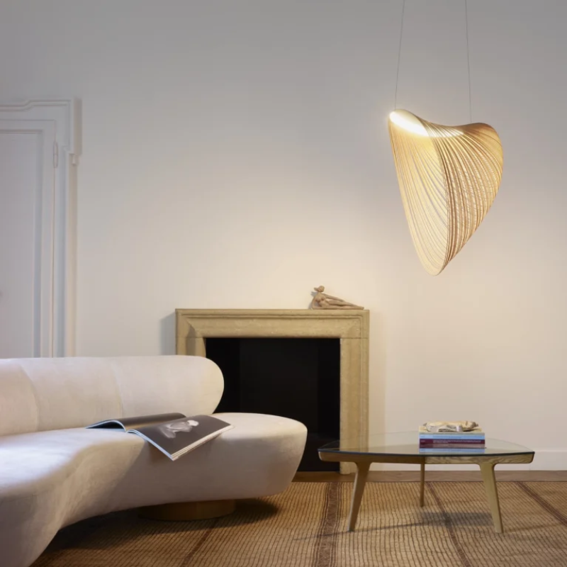 The Illan Chandelier from Luceplan in a living room. all-groups