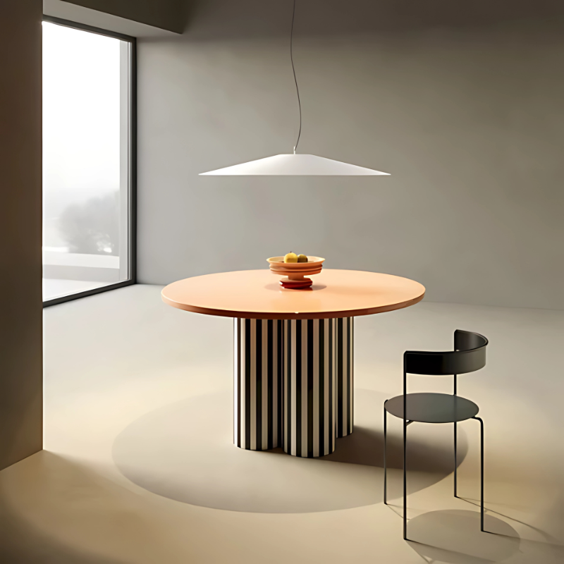 The Koinè Pendant from Luceplan in white in a designer home.