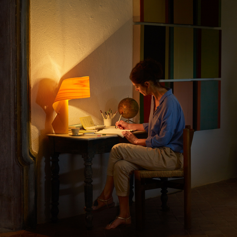 The Air Table from LZF lamps in yellow in a lounge.