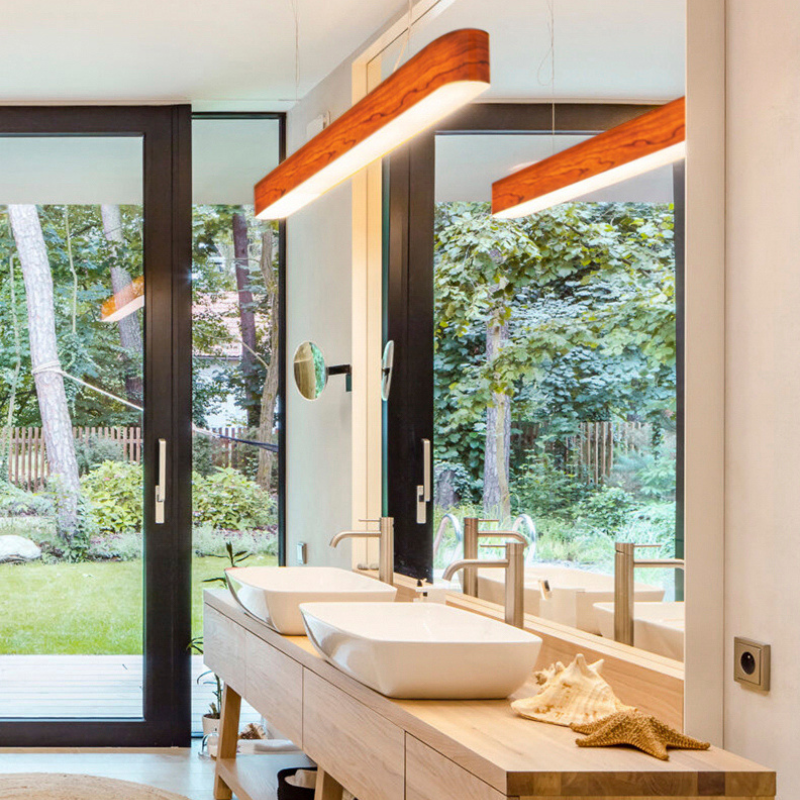 The I-Club Slim Suspension from LZF lamps with the natural cherry veneer in a bathroom.