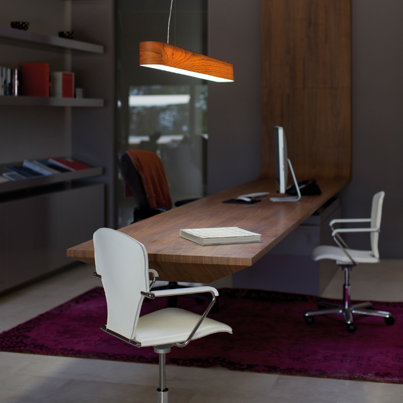 The I-Club Slim Suspension from LZF lamps with the natural cherry veneer in a business office.