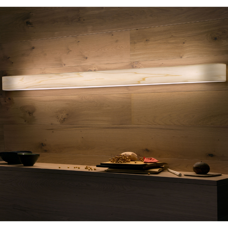 The I-Club Slim Wall from LZF Lamps in ivory white veneer in a dining room.