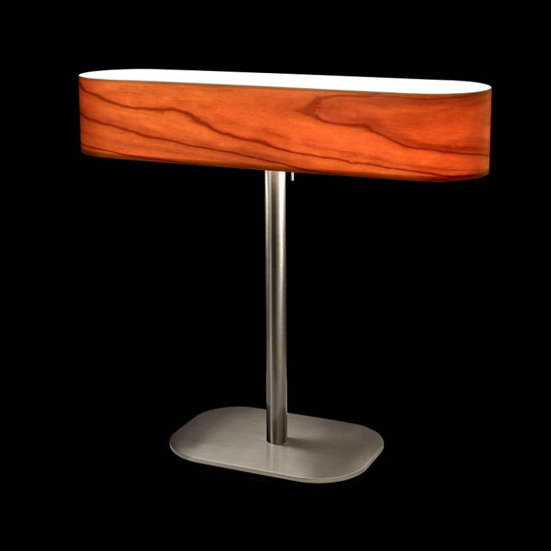 The I-Club Table from LZF lamps with the natural cherry veneer in a studio.