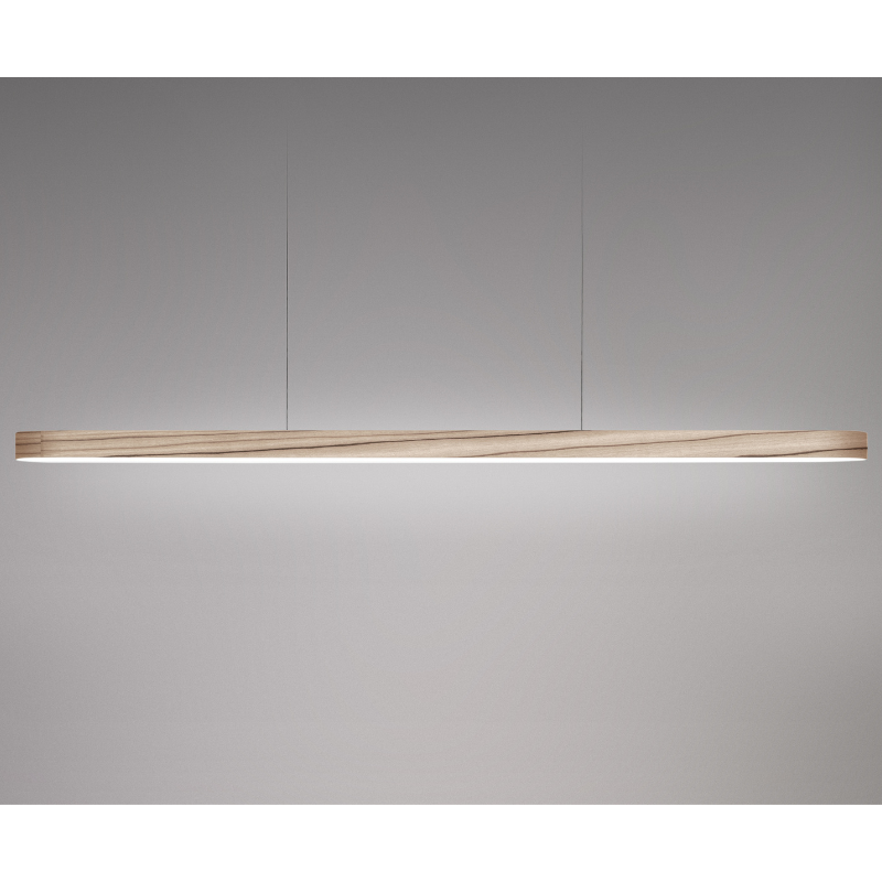 The Long I-Line Suspension from LZF lamps with the grey veneer in a studio.